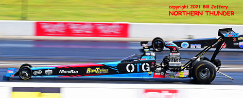 Julie Nataas (near lane) vs Mike Bucher 
(far lane) TAD